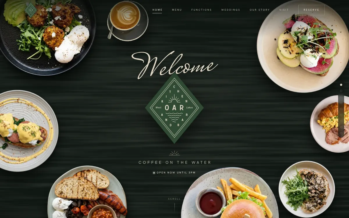 The Oar Lakeside home page: Oar's dishes laid round a dark timber table, with Welcome and the Oar logo in the middle and a live Open now until 3pm status